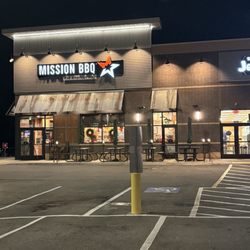 Mission BBQ - Front of store... with the infamous patio umbrella Christmas trees