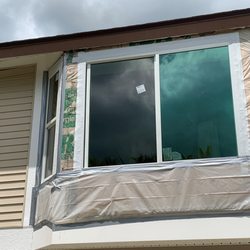 White Aluminum and Windows - Stigum Dry In
