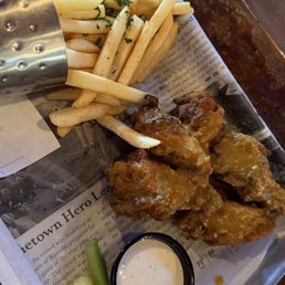 Wings with their signature sauce Wings with their signature sauce