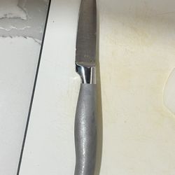 Greg's Sharpening Service - Tip of knife chipped off trying to open a can