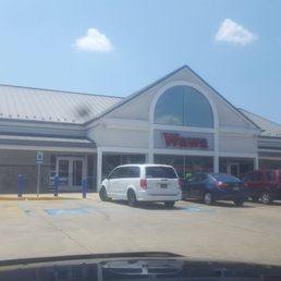cars parked in front of a restaurant