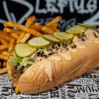 Lefty's Cheesesteaks - a hot dog and french fries - Cheesesteaks Near Me - Clinton Township, Michigan Lefty's Cheesesteaks - a hot dog and french fries - Cheesesteaks Near Me - Clinton Township, Michigan