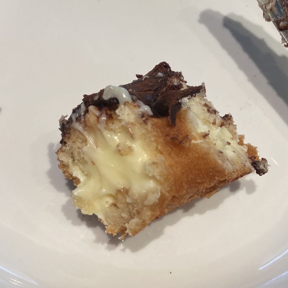 Beacon Doughnuts - Cross section of Bostom Cream donut - Donuts Near Me - Chicago, Illinois Beacon Doughnuts - Cross section of Bostom Cream donut - Donuts Near Me - Chicago, Illinois