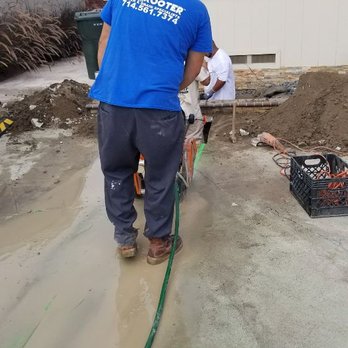TP Rooter - Saw cutting concrete due to sewer line running straight down the middle of drive way. - Plumbing Near Me TP Rooter - Saw cutting concrete due to sewer line running straight down the middle of drive way. - Plumbing Near Me