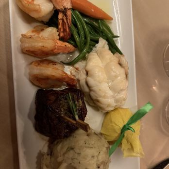 Hugo's Cellar - Surf and turf and surf. Lobster tail, filet, and shrimp - American Near Me - Las Vegas, Nevada