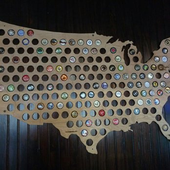 BottleDog Bites & Brews - Look for the bottle cap map. It's a touch of personal flavour...And maybe hides a button for a hidden room. - Beer Bar Near Me - Cary, North Carolina