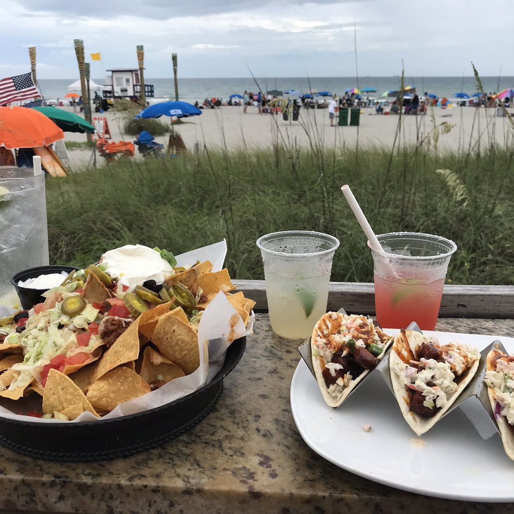 Coconuts On The Beach - Nachos with beef and tacos - Bars Near Me - Cocoa Beach, Florida Coconuts On The Beach - Nachos with beef and tacos - Bars Near Me - Cocoa Beach, Florida
