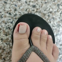 Jasmine Nails - It kept bleeding, even hours later. And he wanted me to PAY with THIS?