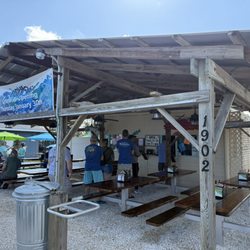 The Fish House - Storefront and seated eating area