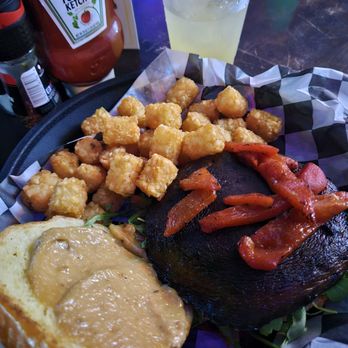 Purple Parrot Grill - vegan portobello burger with tater tots - Bars Near Me - Rehoboth Beach, Delaware Purple Parrot Grill - vegan portobello burger with tater tots - Bars Near Me - Rehoboth Beach, Delaware