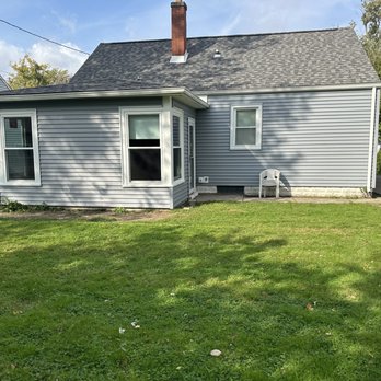 McCarthy Remodeling - Back of house that we did in Tonawanda. We took the windows out  and replaced them. - Siding Near Me