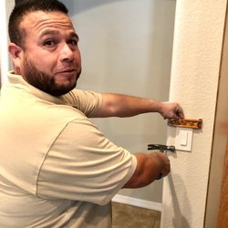 Dodge Electric - Jesus ensuring that not only id the switch plate attached, but it is level as well showing that he cares about the finished job.