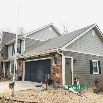 Sure Point Exteriors - James Hardie Timberbark Lap Siding - Windows Installation Near Me - Overland Park, Kansas Sure Point Exteriors - James Hardie Timberbark Lap Siding - Windows Installation Near Me - Overland Park, Kansas
