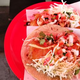 2 fish tacos with cabbage and pico.  I added hot sauce and lime.  Bomb!  Best fish tacos of the day!