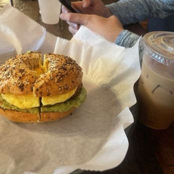 Coffee Break Cafe - Sausage, Egg, Cheese, and Avocado Everything Bagel. Iced Vanilla Latte. - Coffee & Tea Near Me - Pace, Florida Coffee Break Cafe - Sausage, Egg, Cheese, and Avocado Everything Bagel. Iced Vanilla Latte. - Coffee & Tea Near Me - Pace, Florida