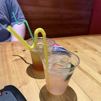 MRB Bar And Restaurant - Pimm's Cup w/green straw; Strawberry Cucumber Chiller w/yellow straw - Sports Bars Near Me - New Orleans, Louisiana MRB Bar And Restaurant - Pimm's Cup w/green straw; Strawberry Cucumber Chiller w/yellow straw - Sports Bars Near Me - New Orleans, Louisiana
