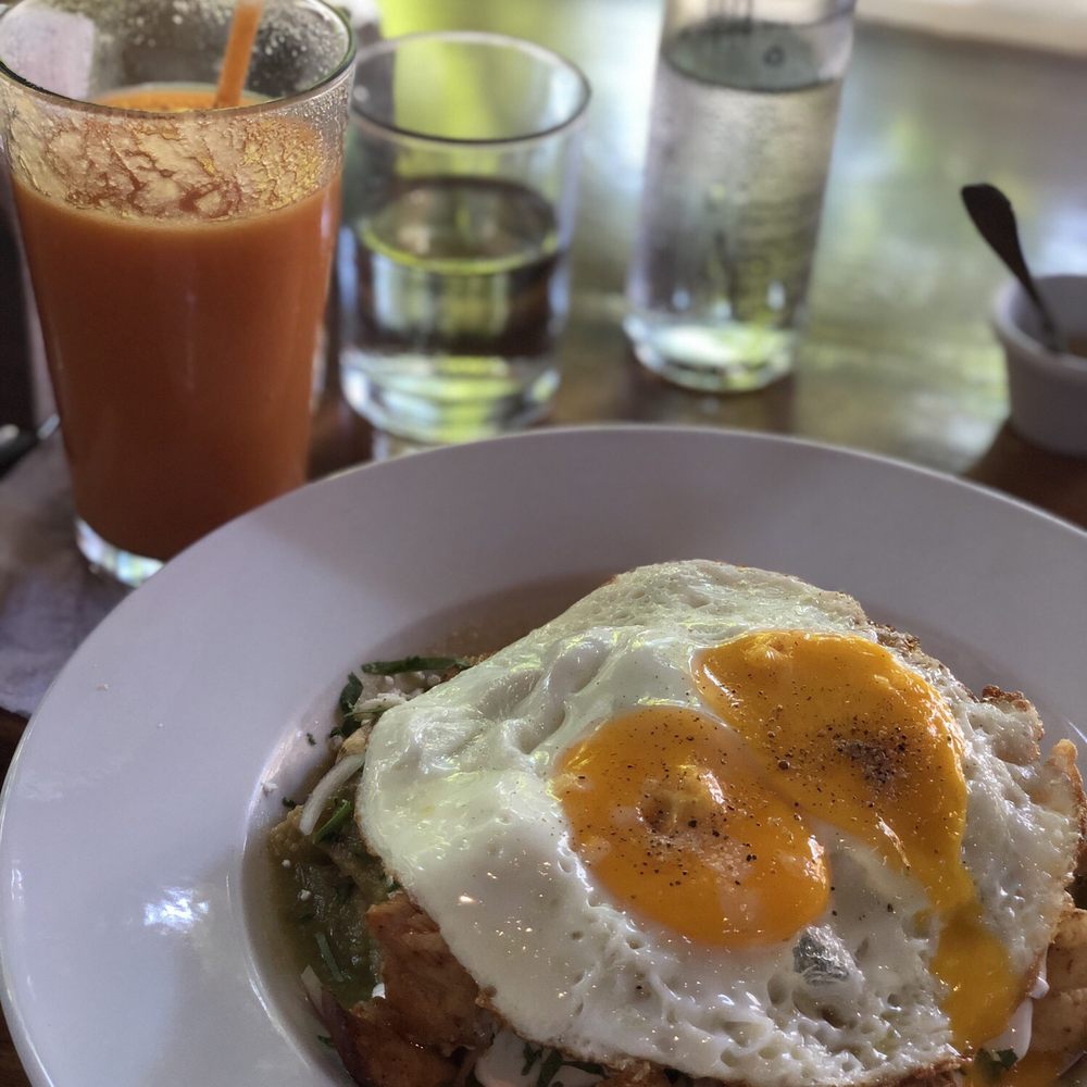 Potheads Beach Road - Chicken chilaquiles with fried egg and Vitamin C Punch In The Mouth - Breakfast & Brunch Near Me - Tulum, ROO