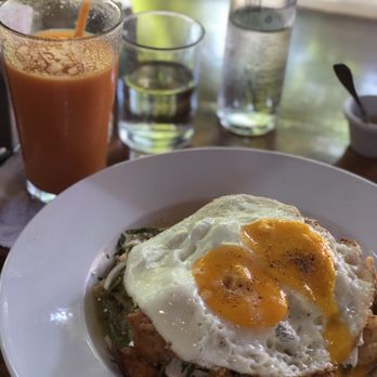 Potheads Beach Road - Chicken chilaquiles with fried egg and Vitamin C Punch In The Mouth - Breakfast & Brunch Near Me - Tulum, ROO