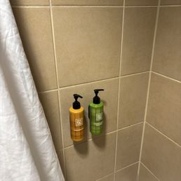 Shampoo and conditioner in bathroom Shampoo and conditioner in bathroom
