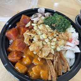 Custom Poke Bowl with spicy tuna and spicy salmon as the protein. Custom Poke Bowl with spicy tuna and spicy salmon as the protein.