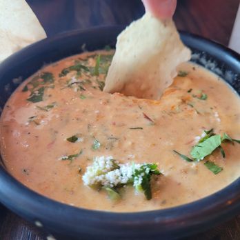 Torchy's Tacos - Queso dip - Tacos Near Me - Colorado Springs, Colorado Torchy's Tacos - Queso dip - Tacos Near Me - Colorado Springs, Colorado