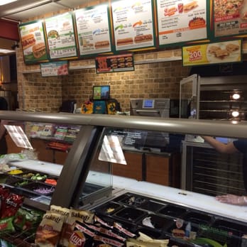 Subway - a woman ordering food at a deli counter - Sandwiches Near Me - Dallas, Texas Subway - a woman ordering food at a deli counter - Sandwiches Near Me - Dallas, Texas