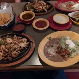 Fajitas (chicken and shrimp), chips w/queso, salsa and guacamole