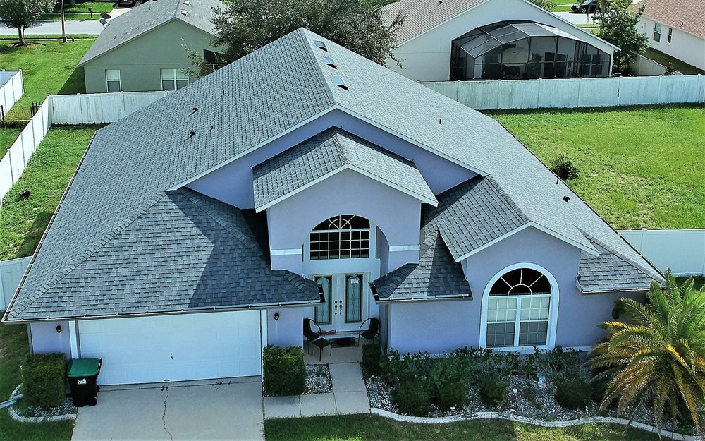 Slide of One World Roofing