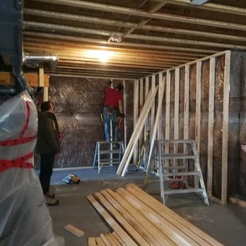 Reno Rocket - a man standing on a ladder in an unfinished room - General Contractors Near Me - Toronto, Ontario Reno Rocket - a man standing on a ladder in an unfinished room - General Contractors Near Me - Toronto, Ontario