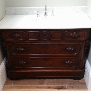 Nobleport Construction - a bathroom vanity with marble top - General Contractors Near Me - Newbury, Massachusetts