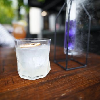 Storm Crow Manor - a glass of water and a glass of ice - Bars Near Me - Toronto, Ontario