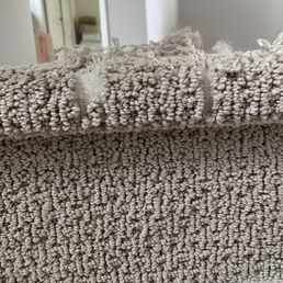 Pre-Repair: Carpet at top of the stair that was torn up by our dog