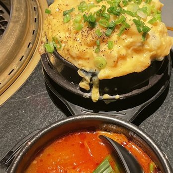 COTE Miami - All the accompaniments/ egg soufflé . Miso soup ( ain't no regular miso soup) Kimchi, just enough heat!! - Korean Near Me - Miami, Florida