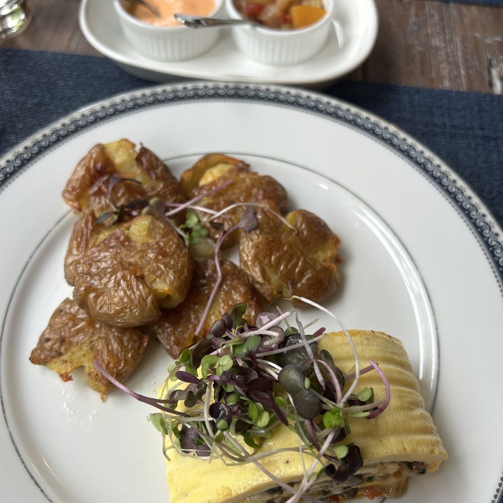 Blue Harbor House - Mushroom and sun-dried tomato breakfast roll and oven roasted smashed potatoes - Bed & Breakfast Near Me - Camden, Maine Blue Harbor House - Mushroom and sun-dried tomato breakfast roll and oven roasted smashed potatoes - Bed & Breakfast Near Me - Camden, Maine