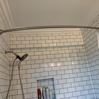 Cabinet Source - Subway tile installed up to the crown moulding - Kitchen & Bath Near Me - Riverside, California