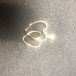 Robert's Jewelers - Two wedding bands made into this Heart Pendant for customer