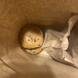 a bagel in a paper bag