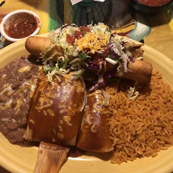 Jalapeno's - Muymacho... soooo sooo tasty and plenty to go home for leftovers! Taquito, flauta, tamale and an enchilada with beans & rice! - Mexican Near Me - Eagle River, Alaska
