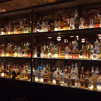 The Smith - Back bar - very nice. Super collection of whiskeys and others.. - New American Near Me - New York, New York The Smith - Back bar - very nice. Super collection of whiskeys and others.. - New American Near Me - New York, New York
