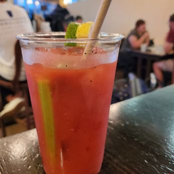 Belgian Beer Cafe - a drink in a glass with a straw - Beer Bar Near Me - Newark, New Jersey