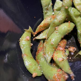 Hon Ramen - Spicy garlic edamame. Half eaten . I couldn't wait. - Ramen Near Me - Bakersfield, California