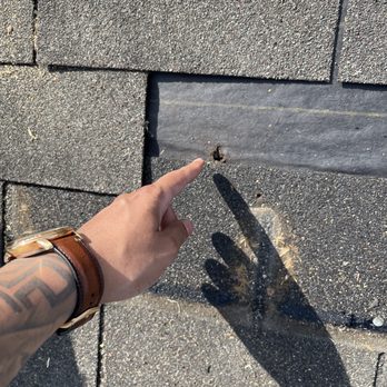 JD Roofing Solutions - Roof Damage caused by a Stray Bullet - Roofing Near Me - Houston, Texas JD Roofing Solutions - Roof Damage caused by a Stray Bullet - Roofing Near Me - Houston, Texas