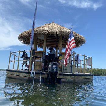 Cruisin’ Tikis Key Largo - Tiki Boat Bar Swimming - Tiki Bars Near Me - Key Largo, Florida