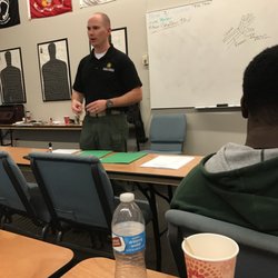 Security & Firearms Training Academy - Jessie meeker teaching taser pepper spray and hndcuffs