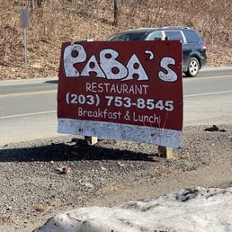The restaurant is set back from the road, and thus easy to miss...so watch out for this sign at the entrance to the parking lot.