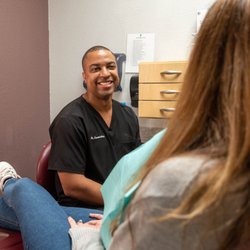 Watauga Dental Center - Dr. Carmichael speaking to patient during their visit at Watauga Dental Center