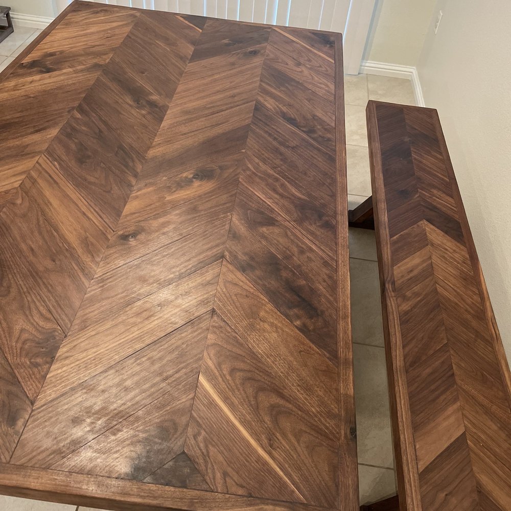 DJ’s Kingdom Builders - Chevron walnut table and bench with trestle bases - Handyman Near Me DJ’s Kingdom Builders - Chevron walnut table and bench with trestle bases - Handyman Near Me
