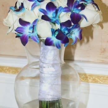 Christine's Flowers - Wedding bouquet. Ivory roses with purple and blue orchids - Florists Near Me - Visalia, California