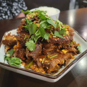 Riceblossom - Sliced braised beef and tripe in chili oil sauce (cold appetizer) - Chinese Near Me - Charlotte, North Carolina Riceblossom - Sliced braised beef and tripe in chili oil sauce (cold appetizer) - Chinese Near Me - Charlotte, North Carolina