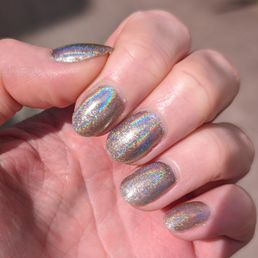 Cat Eye Grey with holographic chrome powder. Cat Eye Grey with holographic chrome powder.